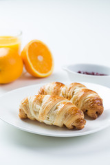 delicious breakfast with croissants and juice