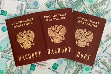 Russian passport on a the background of money