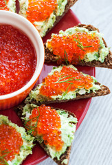 Caviar and avocado toasts