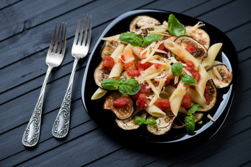 Pasta alla Norma, typical italian dish with eggplant and tomato