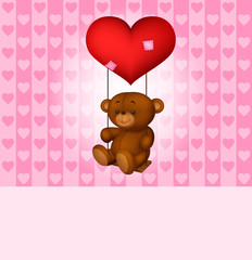 Toy teddy bear swinging on the balloon-heart