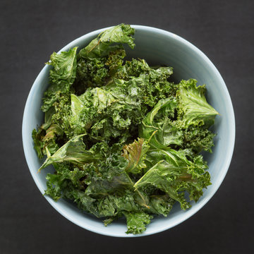Homemade Kale Chips in a Bowl