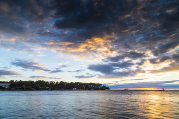 Sunset on lighthouse and island