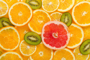 Sliced healthy fruits background