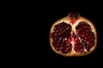Half grenadine isolated on black