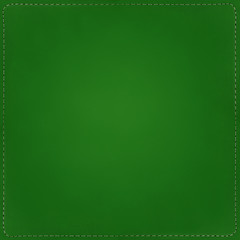 Green textile background with seams