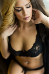 Young woman by the window