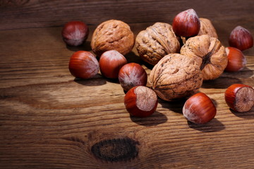 Ripe, healthy nuts on wood background