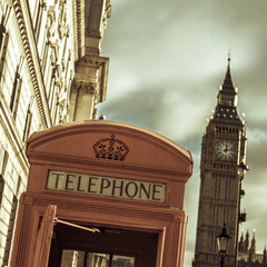 Obraz premium telephone booth and the Big Ben in London, United Kingdom, with