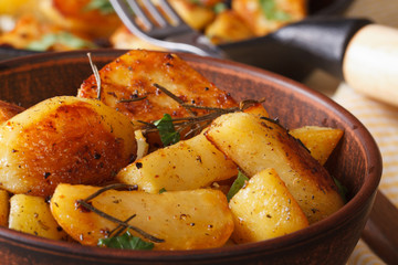 hot fried potatoes in a bowl macro horizontal, rustic