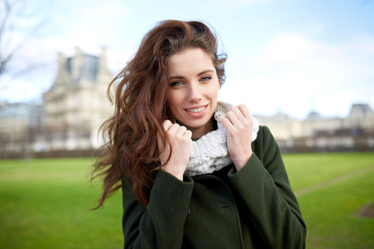 Beautiful Young Woman Smiling. Walking In The Early Spring