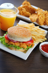 Home made burger with fries.