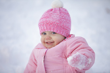 Happy baby girl, winter outdoor