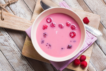 Fresh fruit soup with raspberries and blackberries