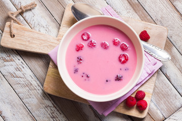 Fresh fruit soup with raspberries and blackberries, top view - 76449576