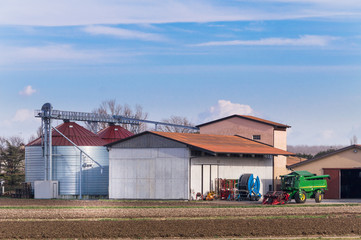 Fototapeta na wymiar Farm with silos