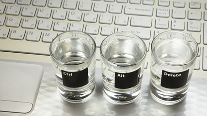 Computer keyboard with &ldquo;Ctr-Alt-Delete&rdquo; command on 3 glasses
