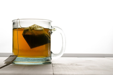 Cup of green tea far left