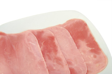 Set of cooked and boiled ham sausage slices on white background.