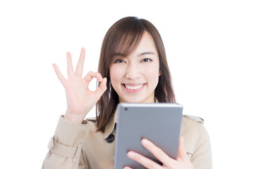 Naklejka premium タブレットを使う女性