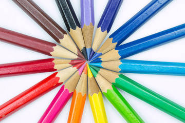 Naklejka premium Colored pencils on white background
