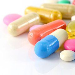 Colorful of oral medications on White Background.