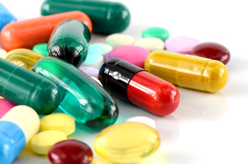 Colorful of oral medications on White Background.
