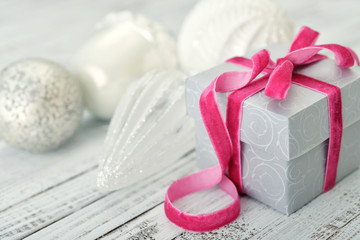 Gift box with pink ribbon