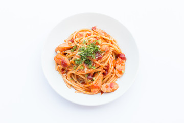 The spaghetti on a white plate.