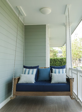 vintage swing and blue pillow