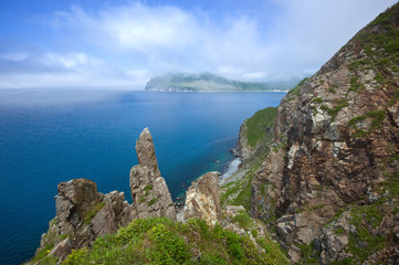 High, steep cliffs of the island Askold.