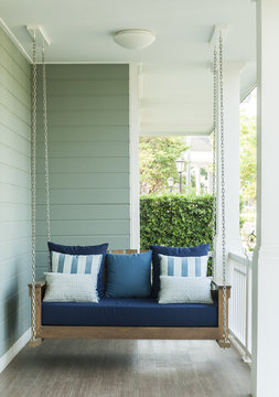 vintage swing and blue pillow