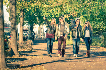 Group of happy best friends walking in Berlin streets