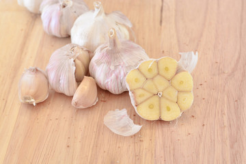 Garlic cut on Wood block