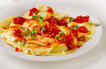 Italian homemade ravioli pasta with  tomato sauce