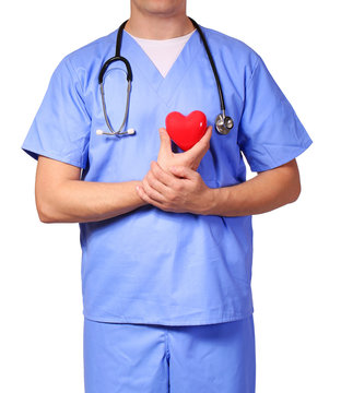 Doctor with heart expressing care, isolated on white