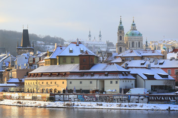 Romantic snowy Prague St. Nicholas' Cathedral, Czech Republic