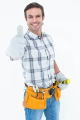 Happy handyman gesturing thumbs up