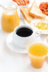 traditional breakfast - coffee, juice, eggs, toasts