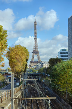Eiffel Tower in Paris and the railway on a sunny autumn day