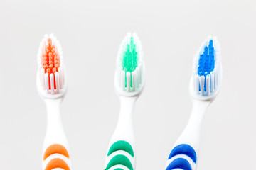 three toothbrushs