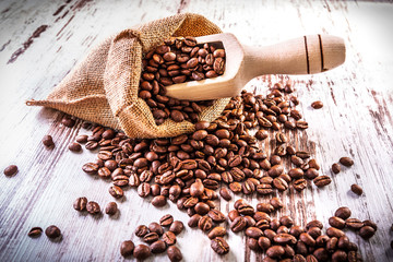 Roasted coffee beans in linen bag