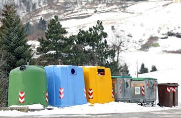 bins for waste paper and used glass bottles