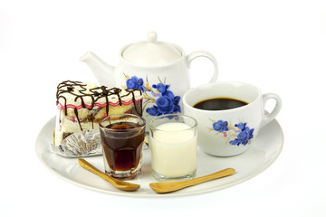cup of coffee and delicious cake