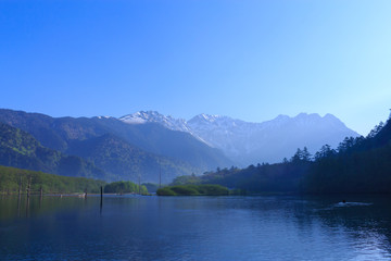Naklejka na ściany i meble Lake Taisho and Hotaka mountains in Kamikochi, Nagano, Japan