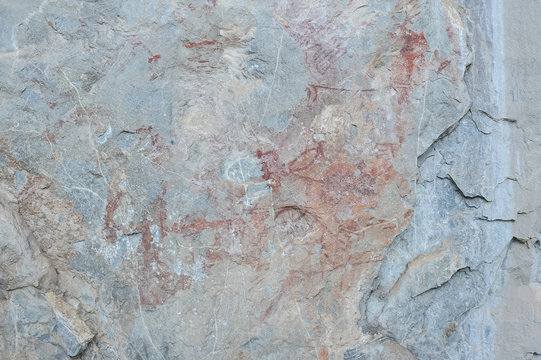 Paint of human hunting on sandstone wall, copy of prehistoric pi