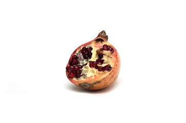Cut half of the fruit - pomegranates. Photo.