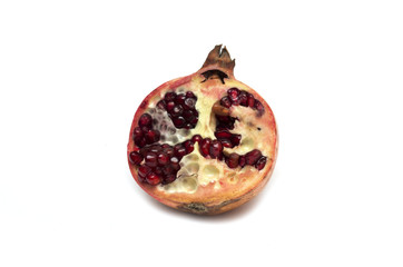 Cut half of the fruit - pomegranates. Photo.