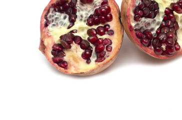 Cut half of the fruit - pomegranates. Photo.