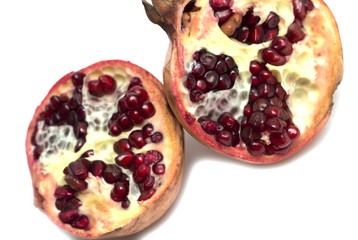 Cut half of the fruit - pomegranates. Photo.